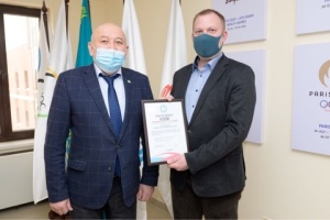 Official presentation of the certificate to the Director of the Nur-Sultan Olympic Training Center